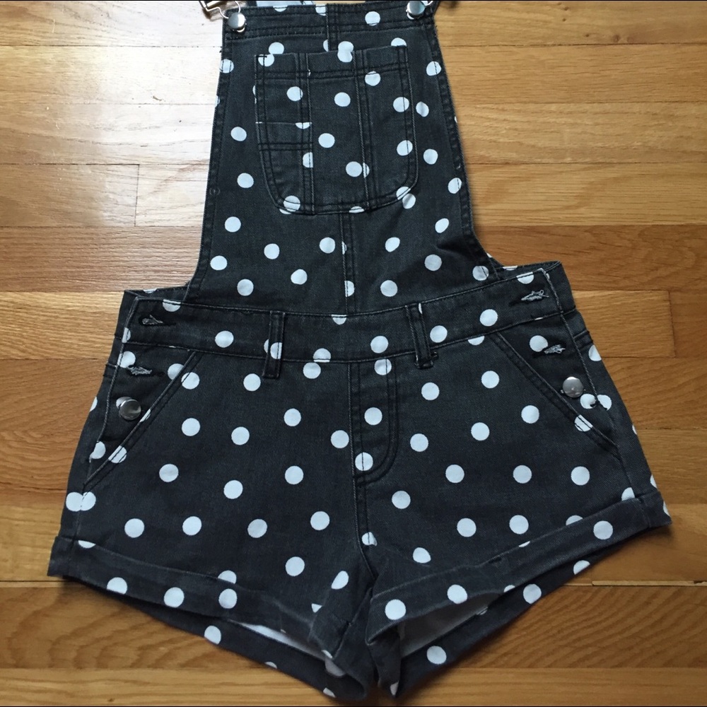 Dark grey & white polka dot overalls. Size Small